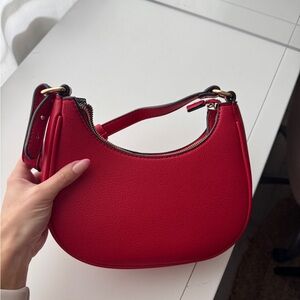 Red Shoulder Bag with Smooth Texture and Minimalist Design